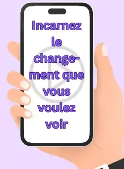 Main tenant un téléphone avec l’inscription « Incarnez le changement que vous voulez voir », symbole de renaître après une rupture amoureuse.